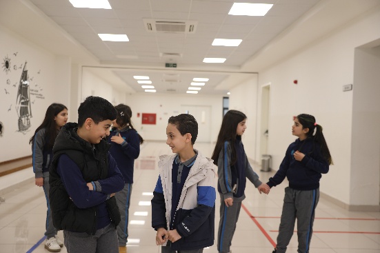 Komar International School students at work